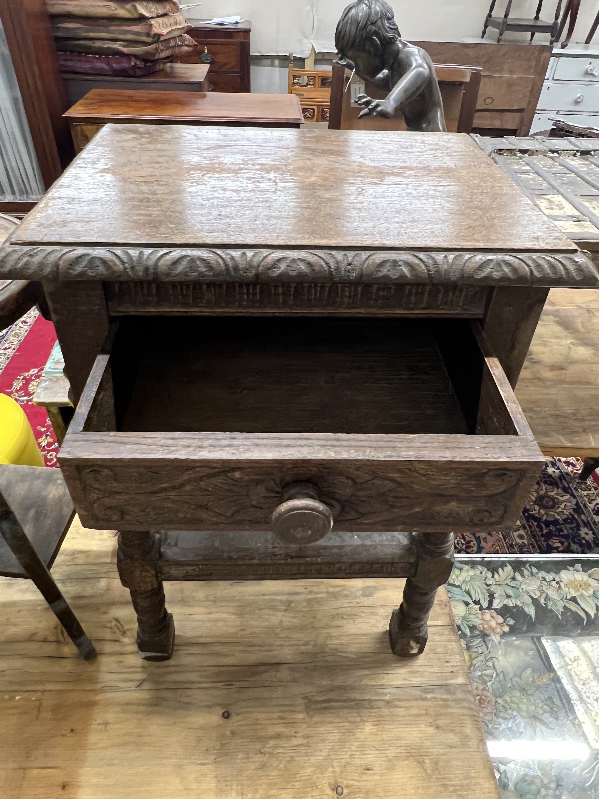 A 17th century style oak two tier occasional table together with a circular occasional table, larger width 43cm, height 63cm